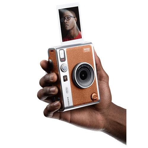 Fujifilm Instax Mini Evo is a hybrid instant camera with a stunning retro  design